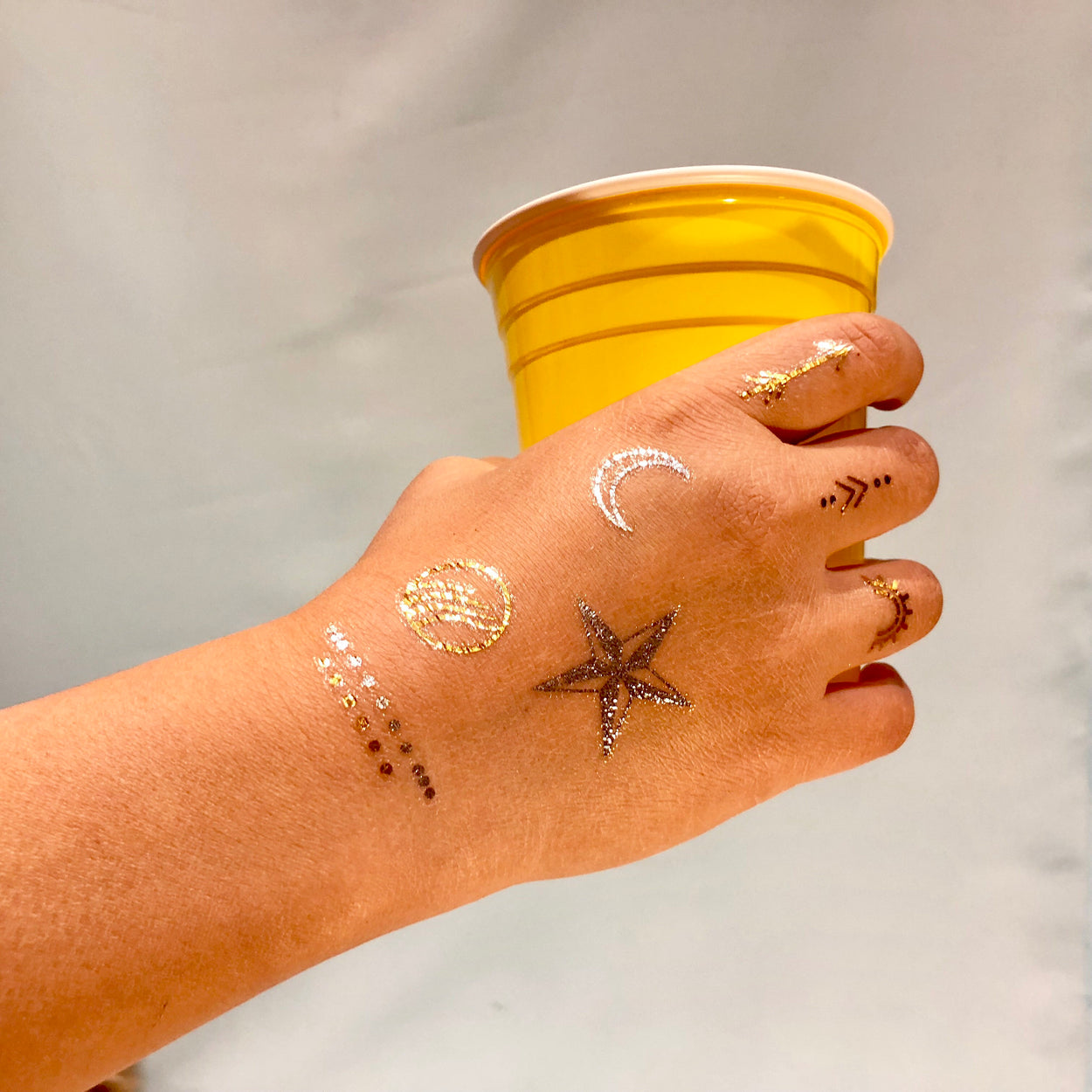 Star & Moon Tattoos in Gold/Silver | Small icon pictograms, 3 sets of 7 temporary tattoos